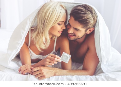 beautiful-young-couple-hugging-smiling-260nw-499266691.jpg
