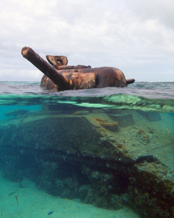 this-sherman-m-tank-was-stranded-on-the-reef-during-the-invasion-of-the-island-of-saipan-during-wwi--29477.jpg