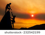 stock-photo-climbers-on-the-summit-of-a-challenging-cliff-232542199.jpg