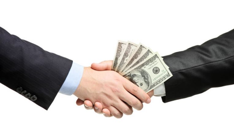 0fabc984-moneyHandshake.jpg