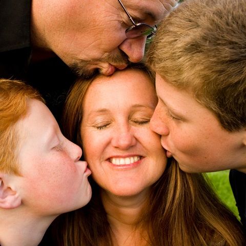 ka-family-kissing-mom-istock-photo-10959396.jpg