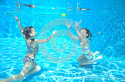 children-swim-pool-underwater-girls-have-fun-water-happy-active-kids-sport-family-vacation-62204181.jpg