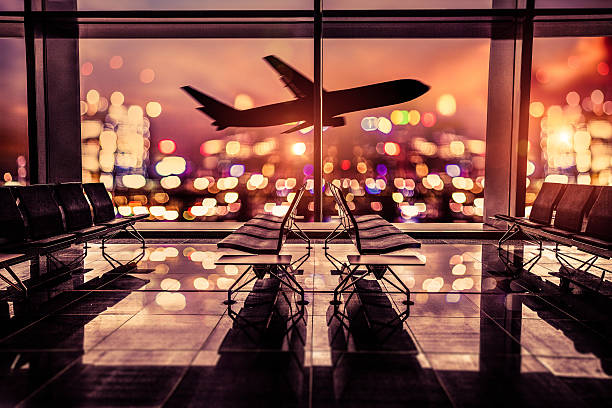airport-lounge-and-airplane-take-off-in-the-city-picture-id502384018.jpg