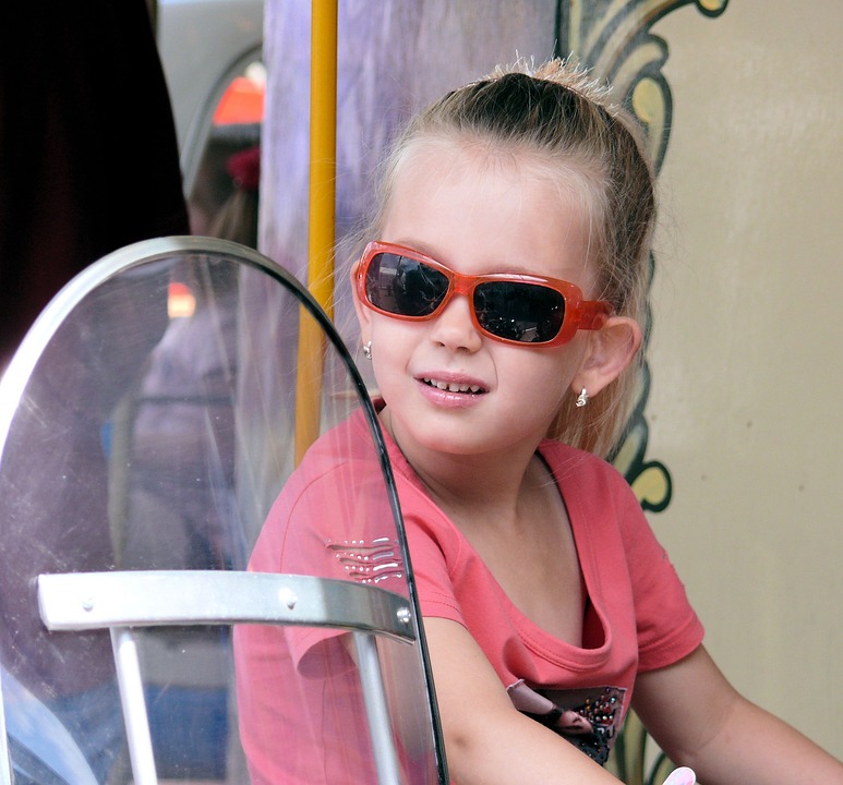 Girl Sunglasses Funfair Bicycle.jpg