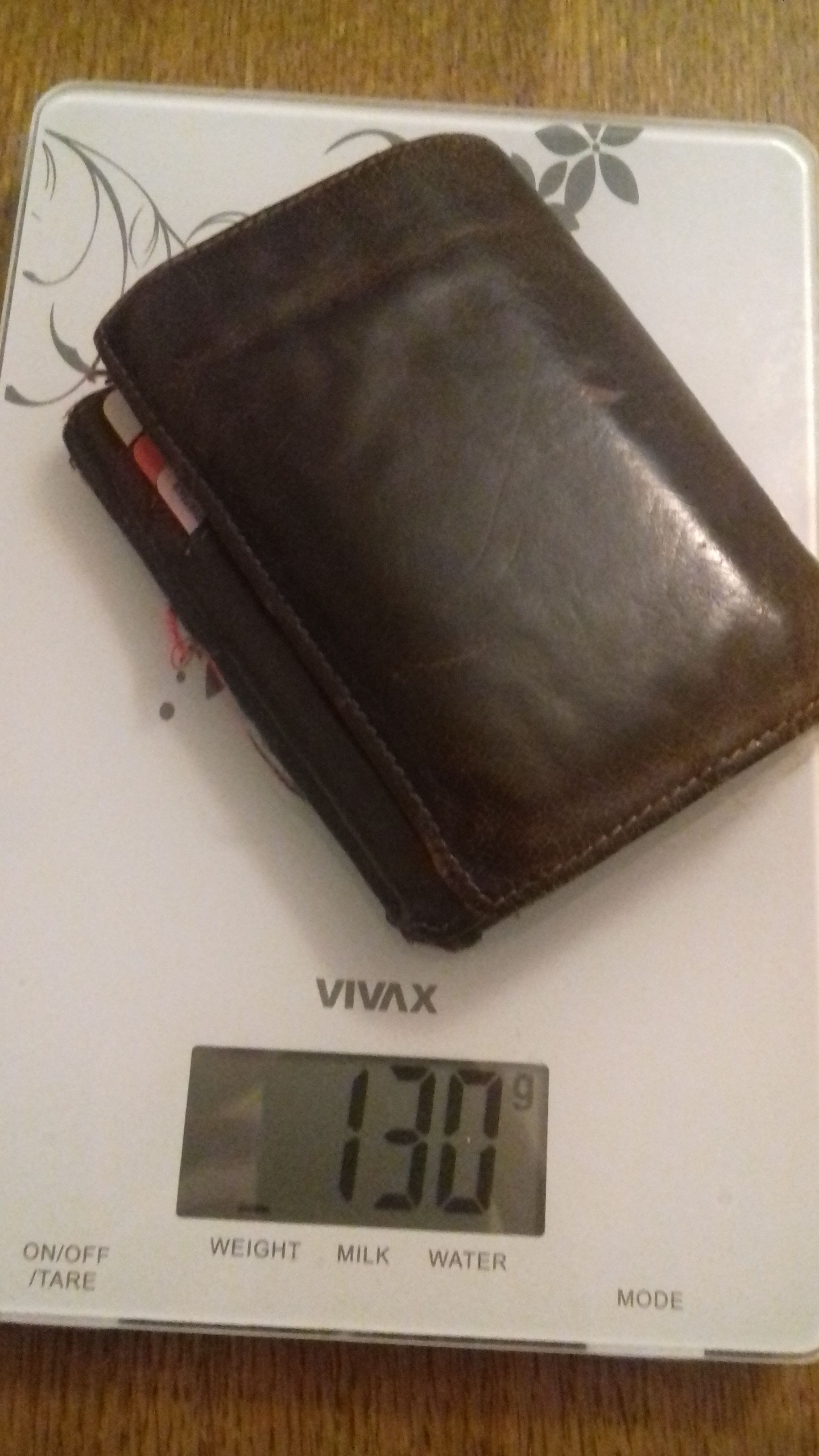 how much does a mk wallet weigh