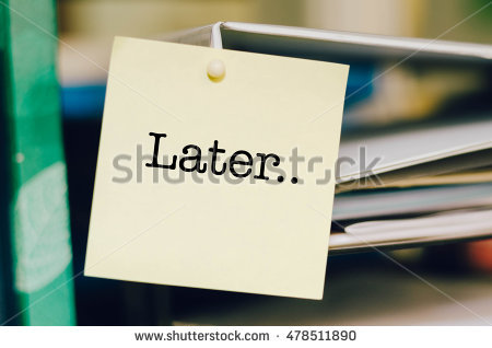 stock-photo-procrastination-and-urgency-concept-with-word-later-on-yellow-sticky-paper-over-blurred-background-478511890.jpg