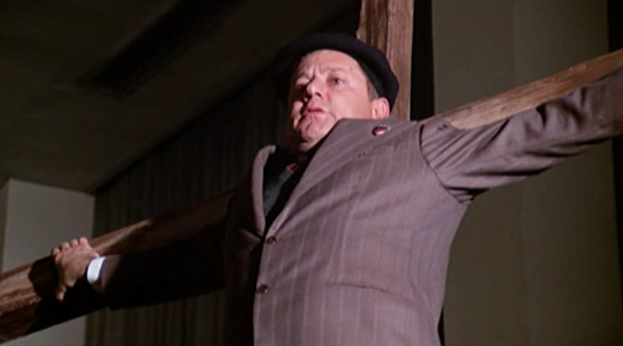 Paolo_Villaggio_Crucified_Fantozzi.png