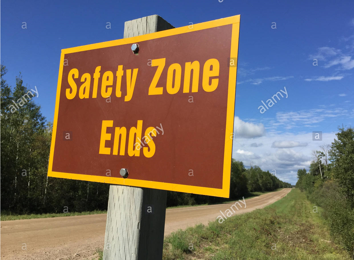 safety-zone-ends-sign-in-rural-area-J23H5A.png