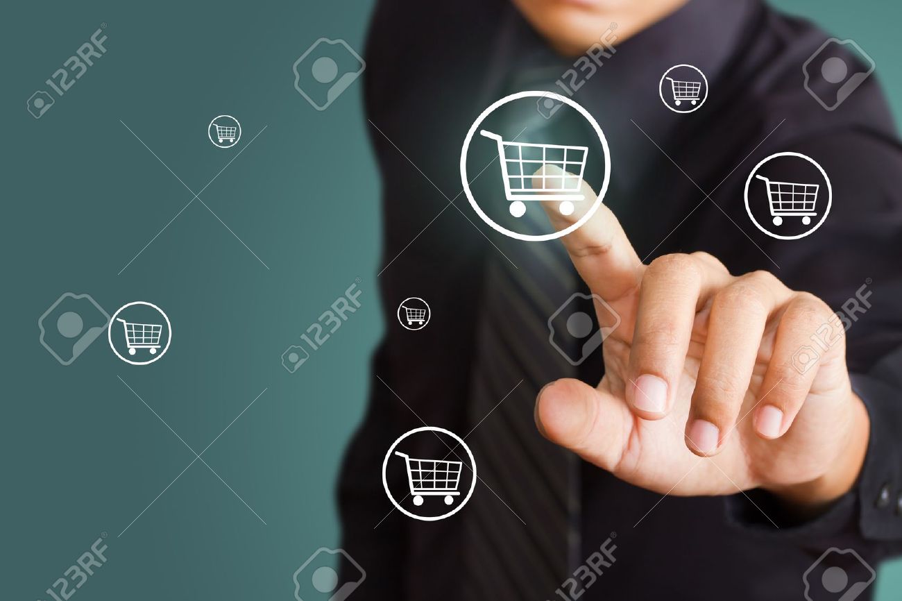 15892058-Business-man-pressing-shopping-cart-icon-Stock-Photo-shop-marketing.jpg