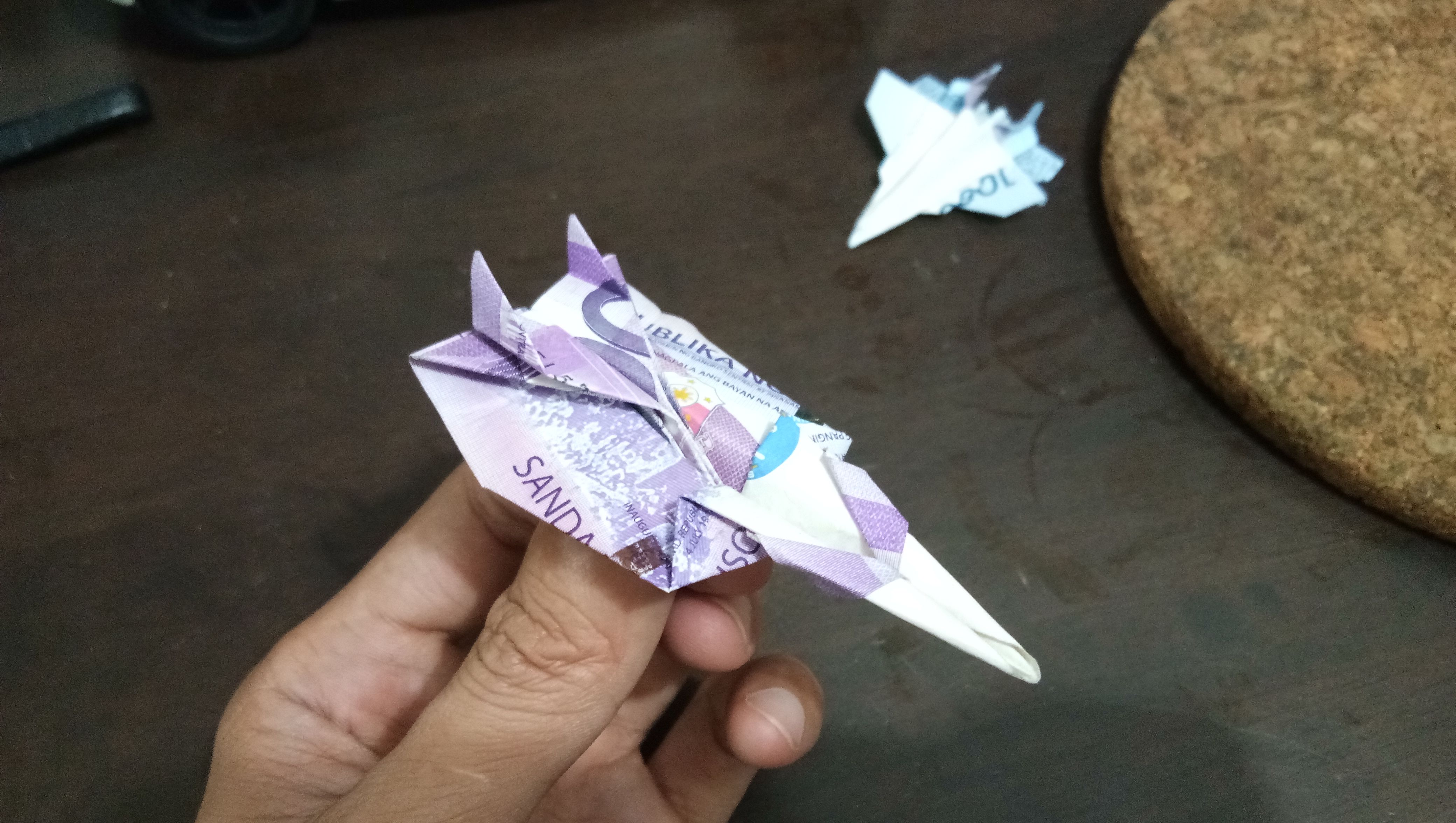 Steps On How To Make Fighter Jet Origami Using 100 Peso