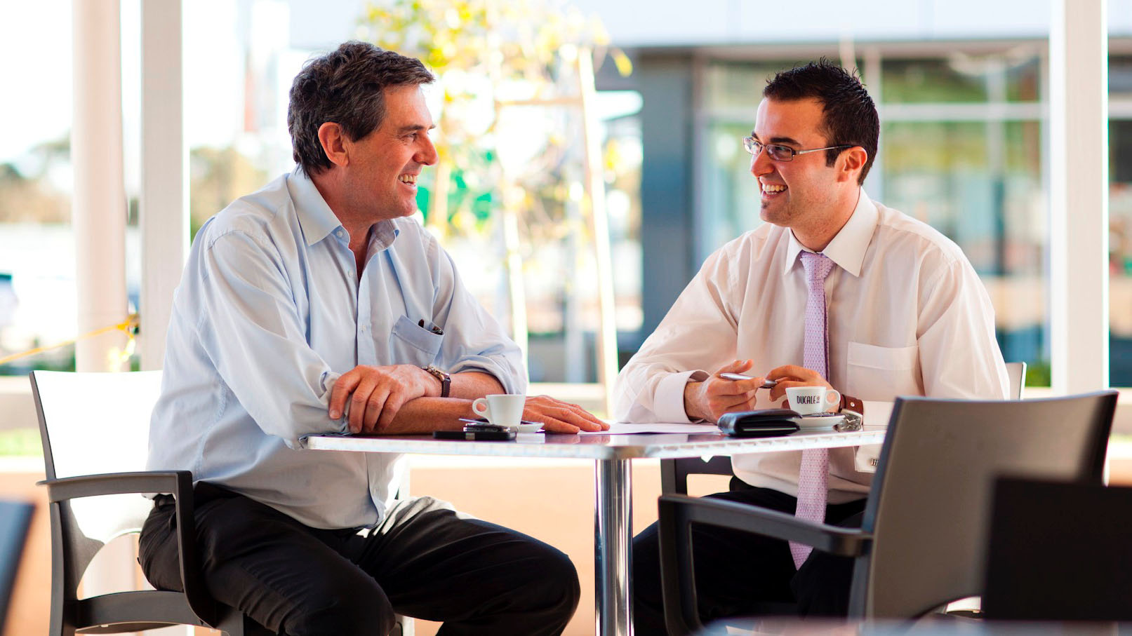 biz-meeting-over-coffee-copy (1).jpg