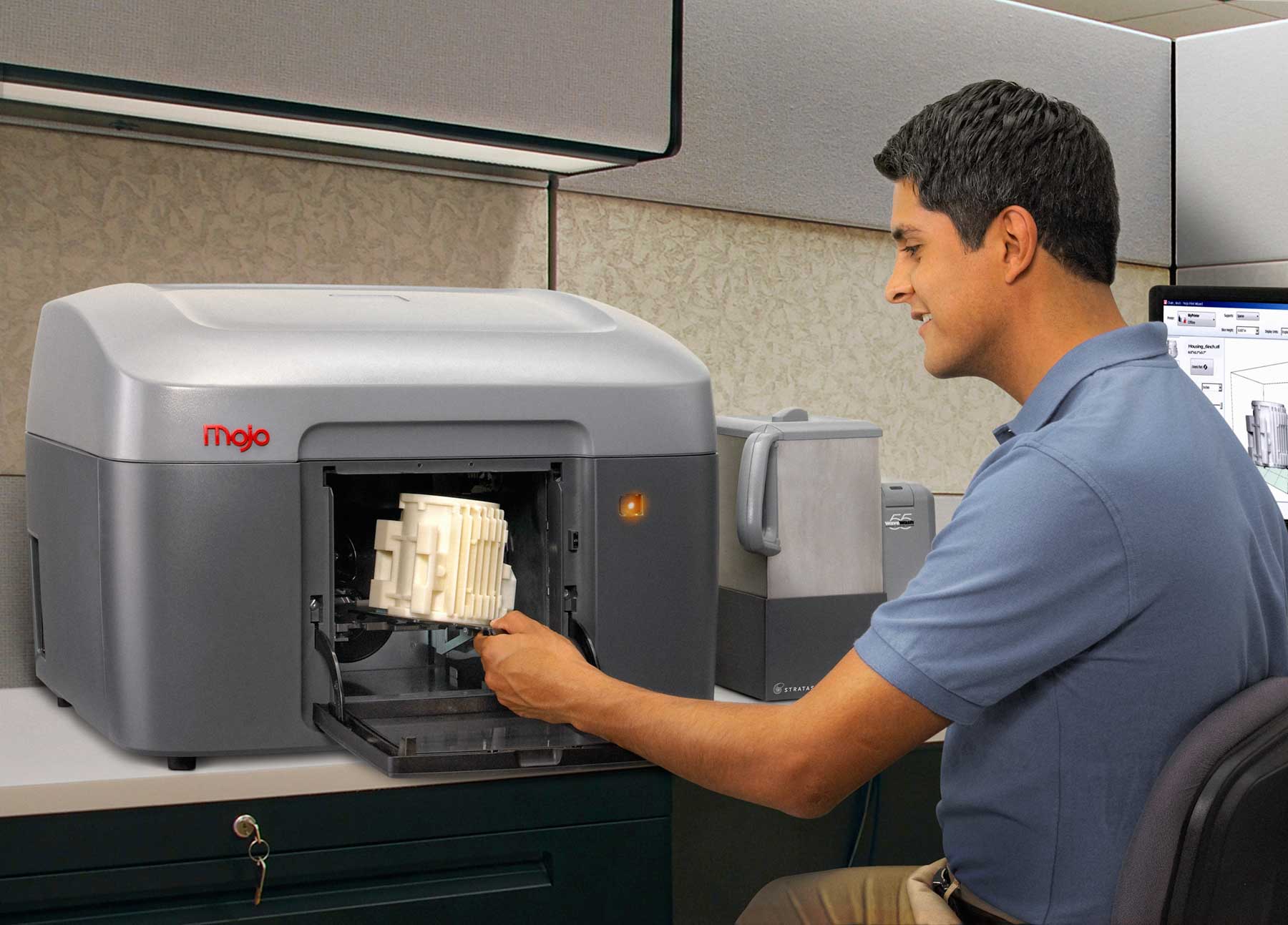 Mojo-3D-printer Engineer-removing-part Introduces Desktop Professional 3D Printer Mojo Make Parts Fast.jpg
