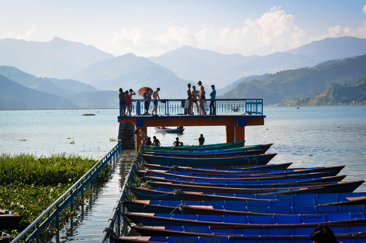 129.Boats docked along Fewa Lake, Pokhara, Nepal..jpg