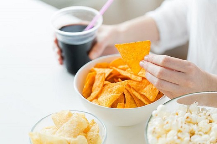 eating-chips-junk-food-salty-woman-1000.jpg