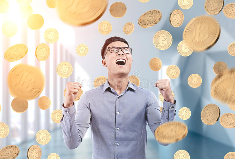 happy-asian-businessman-under-bitcoin-rain-office-portrait-young-wearing-glasses-blue-shirt-standing-96113281.jpg