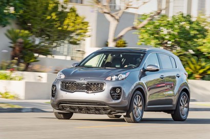 2017-Kia-Sportage-EX-AWD-front-three-quarter-in-motion-12.jpg