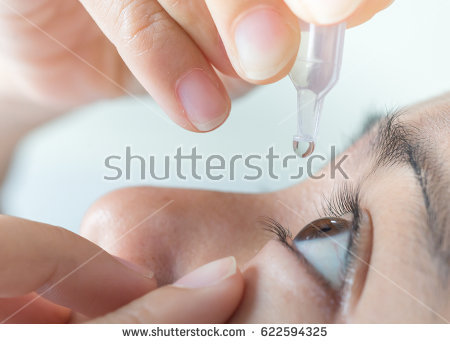 stock-photo-closeup-view-of-young-man-applying-eye-drop-artificial-tears-622594325.jpg