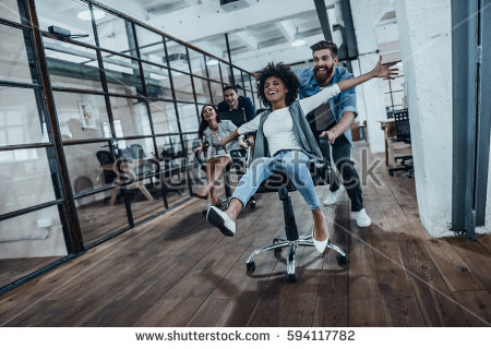stock-photo-we-are-the-winners-four-young-cheerful-business-people-in-smart-casual-wear-having-fun-while-594117782.jpg