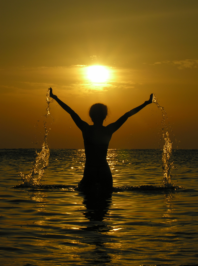 bigstock-Woman-At-Sunrise-With-Drops-Of-433176.jpg
