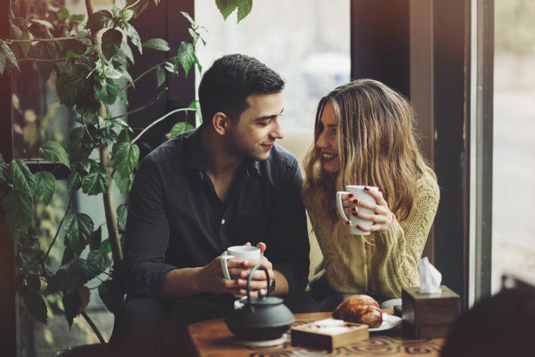 Couple-in-love-drinking-coffee-in-coffee-shop-2-768x512.jpg