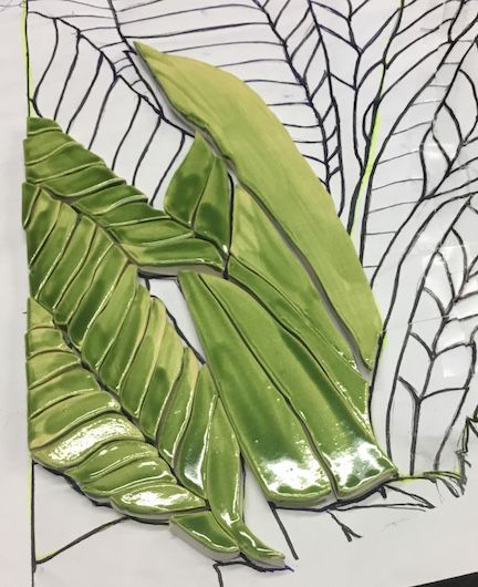 arranging banana tree parts.jpg