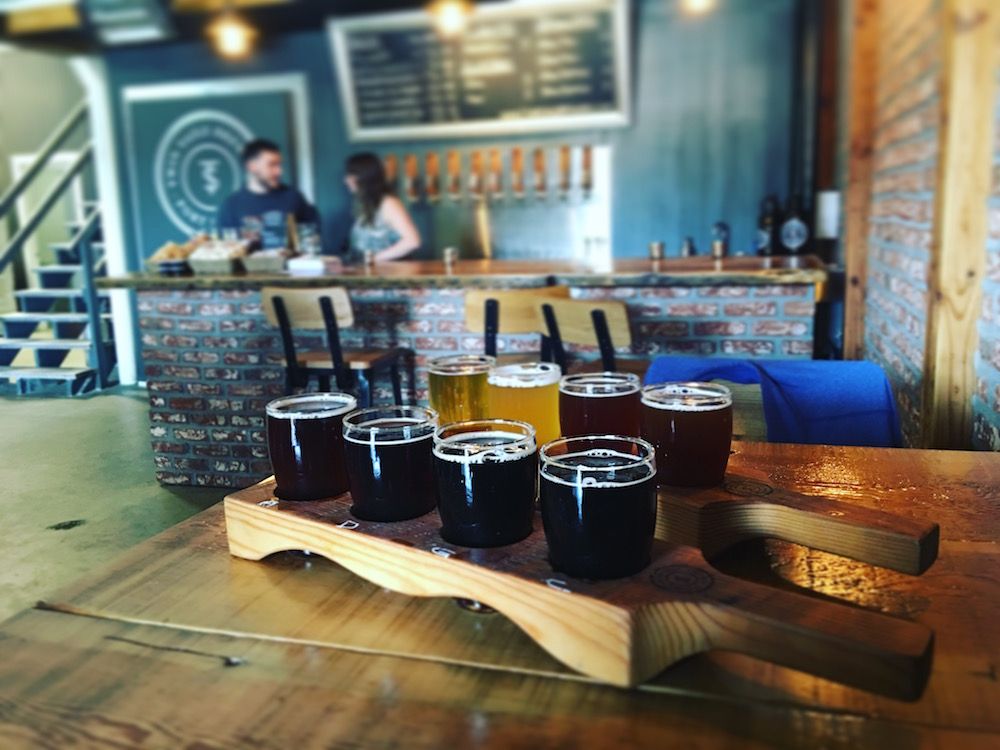 Two-tasting-flights-at-Twin-Sails-Brewing.jpg