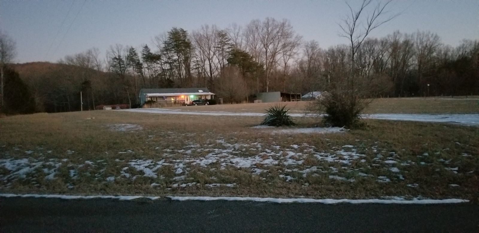 20180118_172507 front of house from road at dusk.jpg