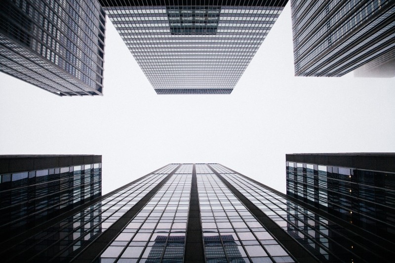 low-angle-view-of-skyscraper-with-reflections-bw.jpg