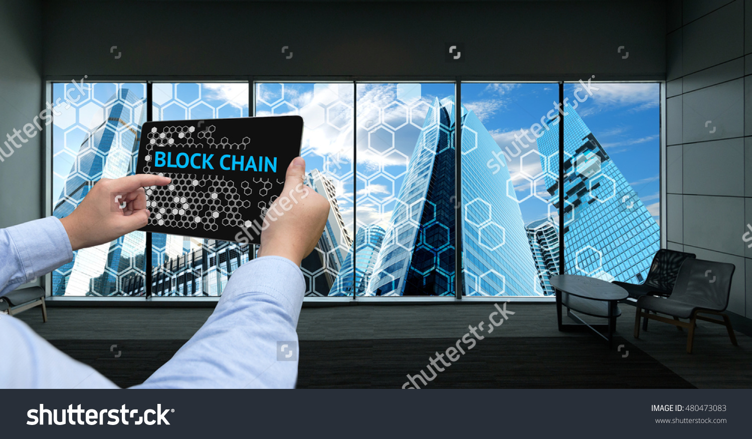 stock-photo-cryptocurrency-blockchain-and-bitcoin-concept-distributed-ledger-technology-man-holding-tablet-480473083.jpg