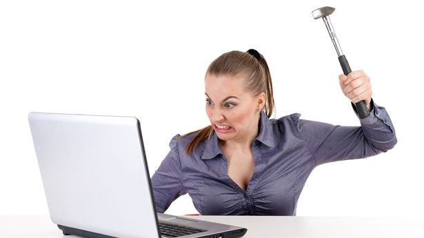 angry-woman-hammer-computer-shutterstock.jpg