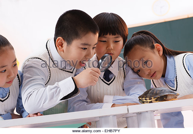 Student with magnifying glass.jpg