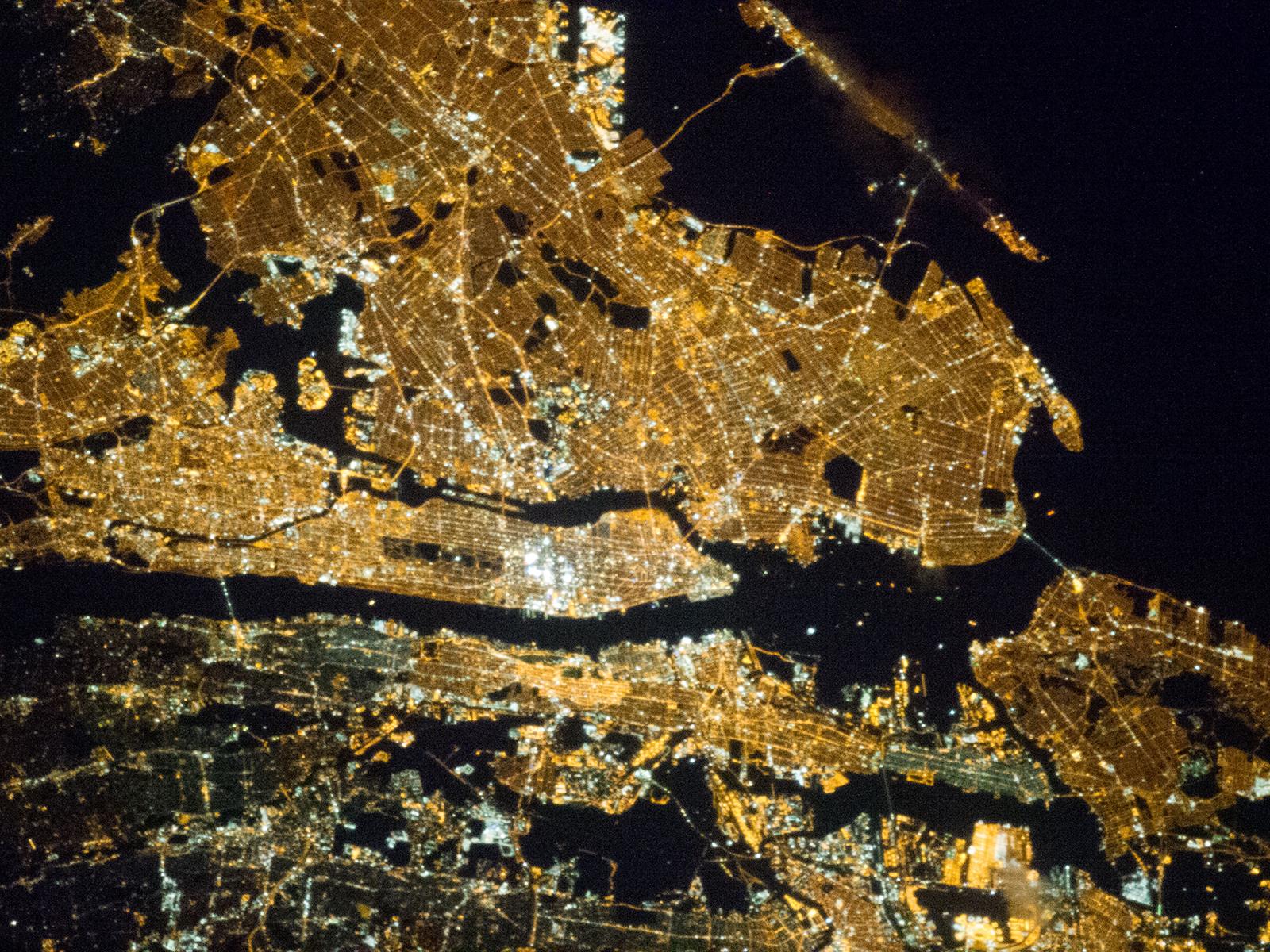 new-york-city-metropolitan-area-at-night-from-space.jpg