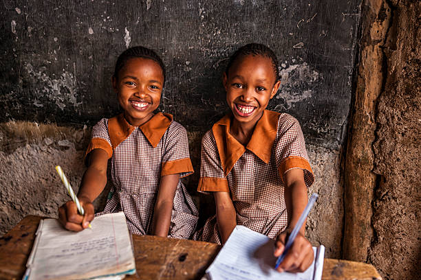 african-little-girls-are-learning-english-language-orphanage-in-kenya-picture-id636215476-1.jpg