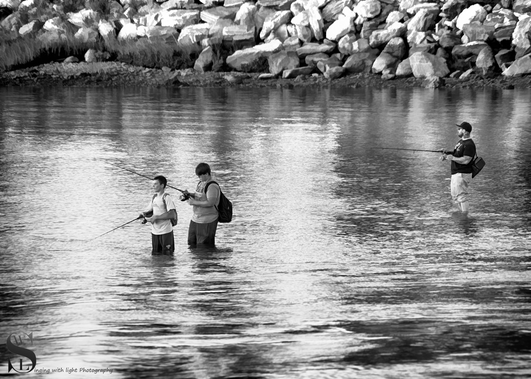 fishing by the rock wall.jpg