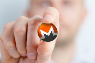 monero-coin-fingertips2-1024x681.jpg