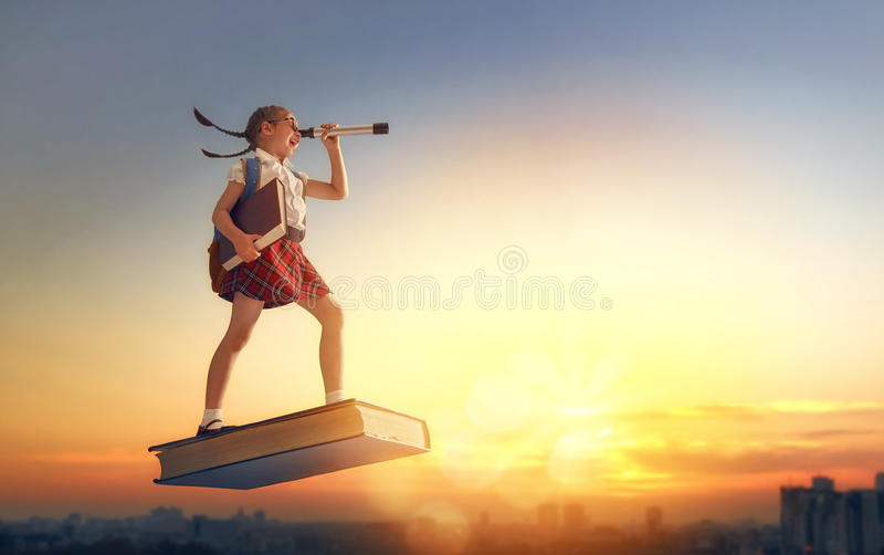 child-flying-book-back-to-school-happy-cute-industrious-background-sunset-urban-landscape-concept-education-95615673.jpg