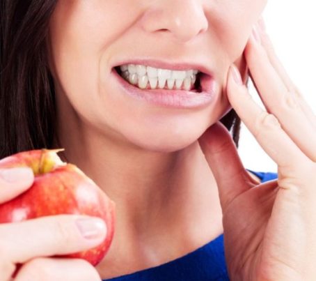 tmj-toothpain-woman-apple-7650-e1501775056276-768x683.jpg