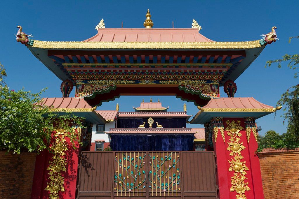 1web-a-gate-of-the-great-drigung-kagyud-lotus-stupa-in-lumbini-nepal-german-monastery1.jpg