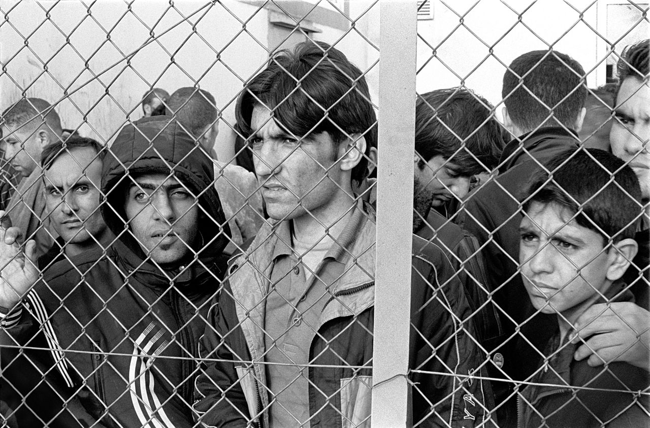 1280px-20101009_Arrested_refugees_immigrants_in_Fylakio_detention_center_Thrace_Evros_Greece_restored.jpg