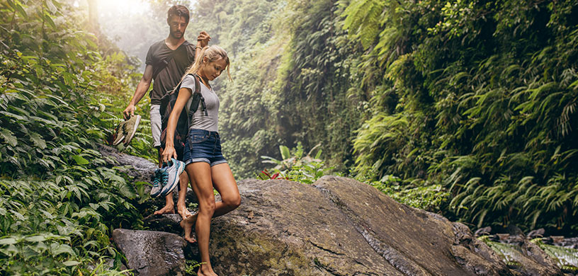 couple-walking-barefoot-through-the-forest-and-grounding.jpg