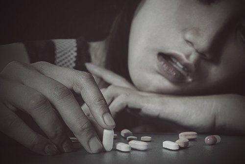 drugabuse_istock-61481478-teen-girl-balancing-pill-on-table-with-finger.jpg