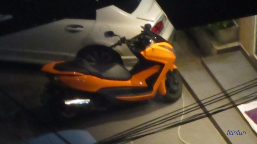 tuesday orange motorcycle.jpg