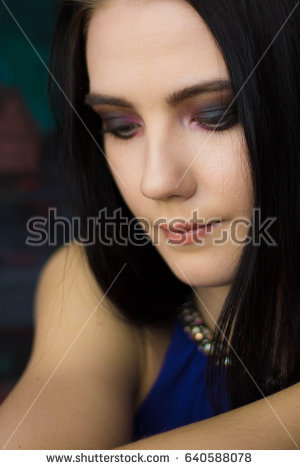 stock-photo-portrait-of-a-natural-beautiful-girl-with-dark-hair-640588078.jpg