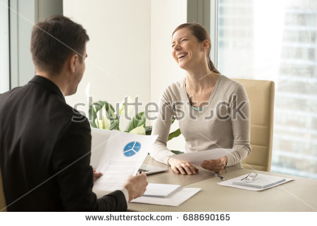 stock-photo-happy-colleagues-laughing-during-pleasant-funny-conversation-in-office-positive-businesspeople-688690165.jpg