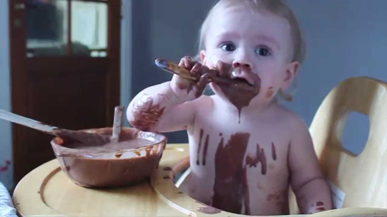 cute babies eating chocolate