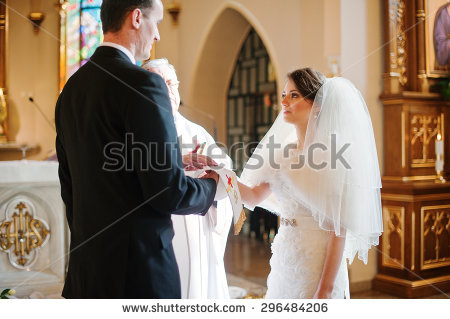 stock-photo-christian-wedding-couple-at-catholic-church-296484206.jpg