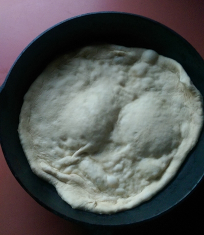 Place rolled dough in hot pan.jpg