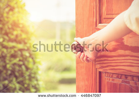stock-photo-women-hand-open-door-knob-or-opening-the-door-446847097.jpg