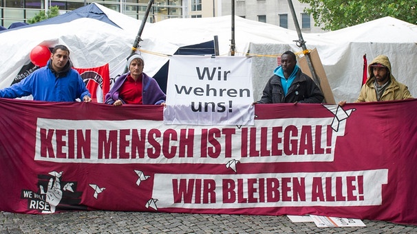 fluechtlinge-demonstration-muenchen-100__v-img__16__9__l_-1dc0e8f74459dd04c91a0d45af4972b9069f1135.jpg