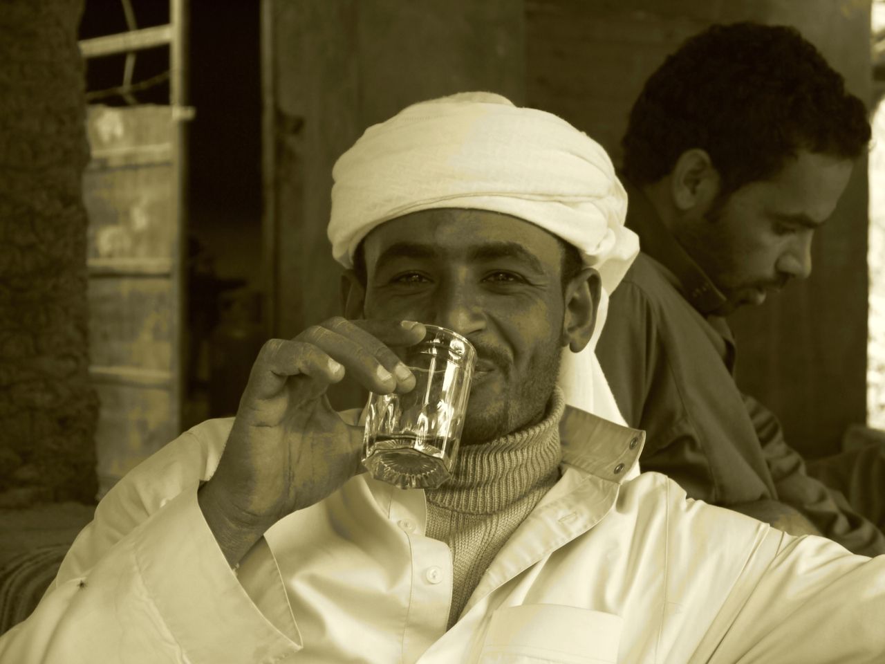 16547045278 - monir the camel man takes tea at the oasis near.jpg